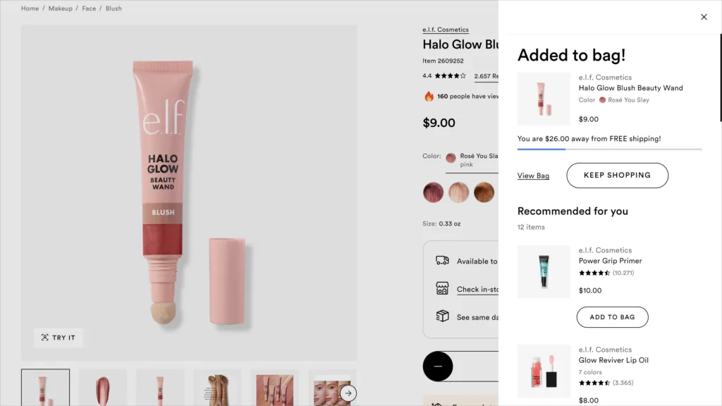 Página de produto da Ulta Beauty no computador: painel Added to bag com a frase You are $26.00 away from FREE shipping e barra de progresso
